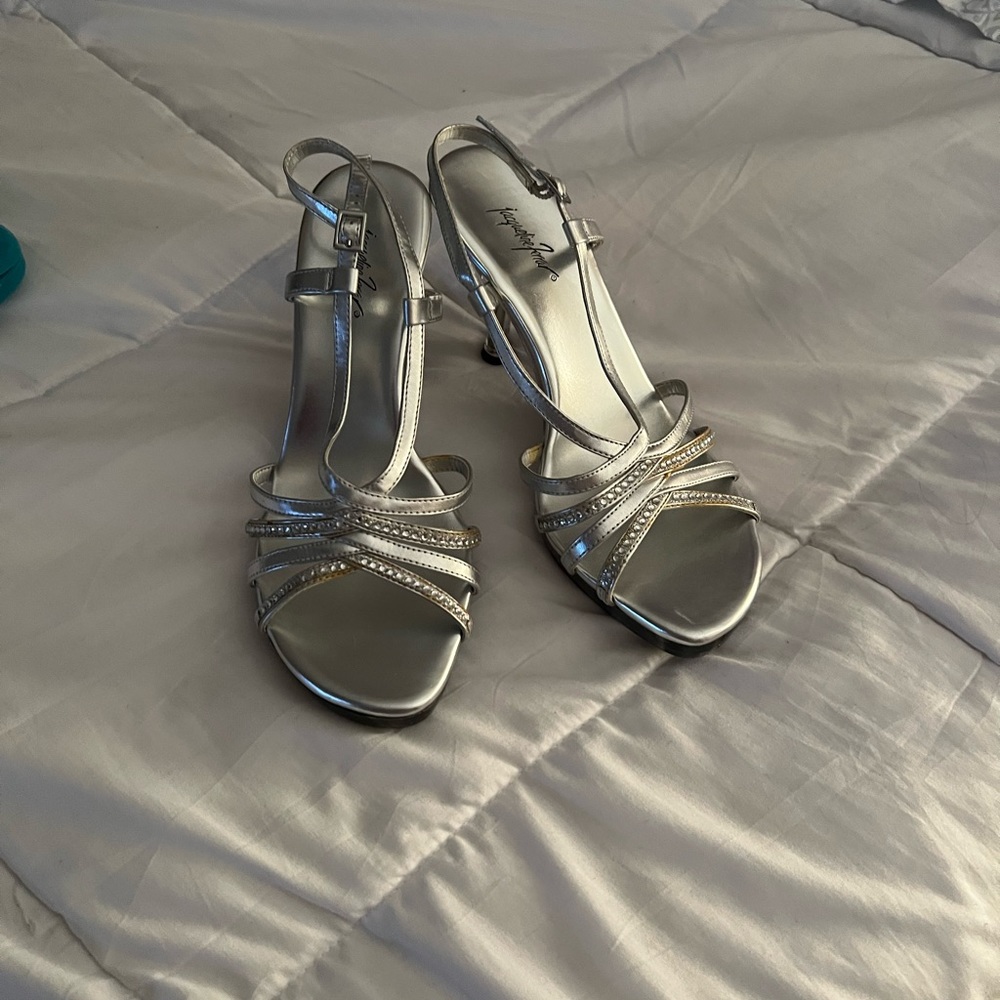 Silver fancy sandals with see through foot bed and heel